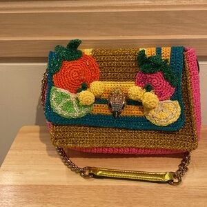 A very gorgeous chrochet metallic bag from a London England designer